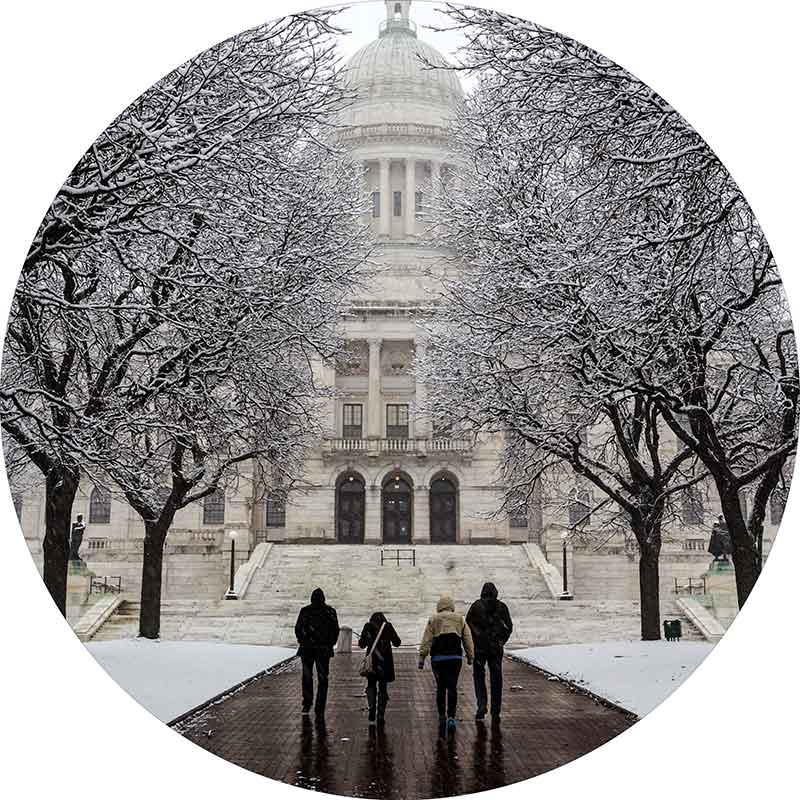 Rhode Island Capitol and people in the snow