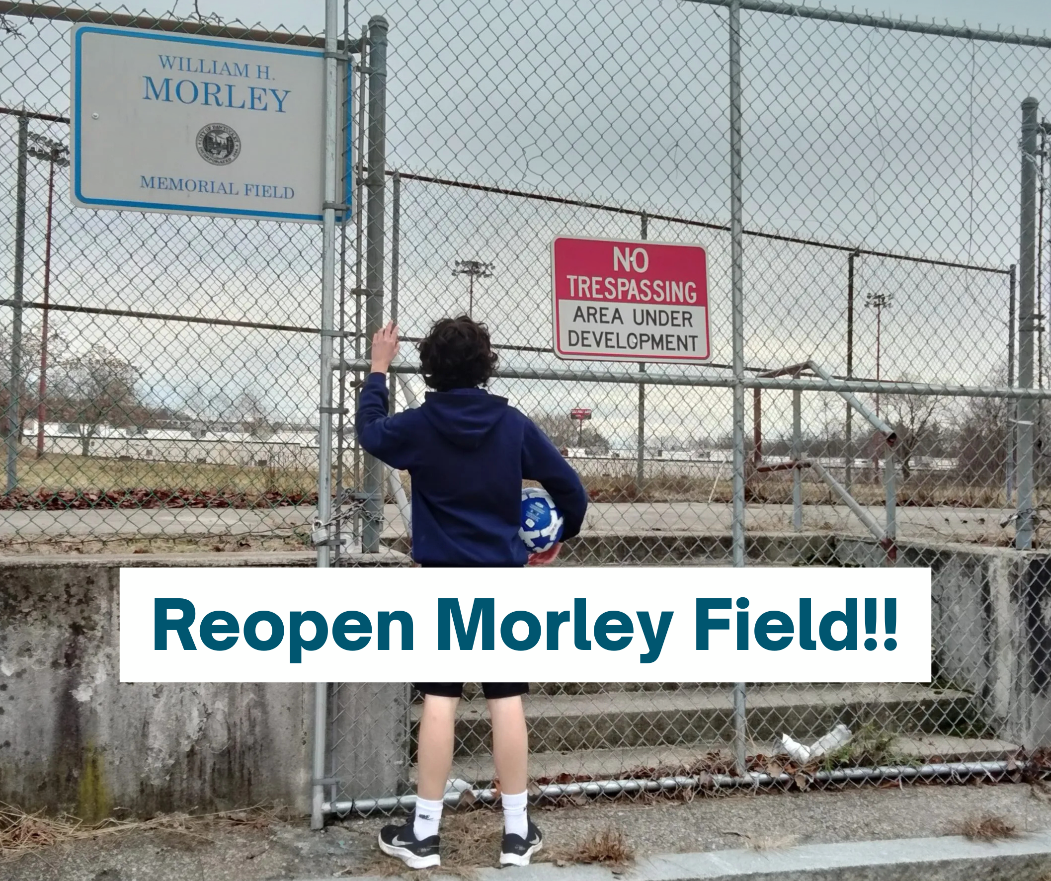 Person in front of chain link fence with soccer ball. Not allowed to go onto field.